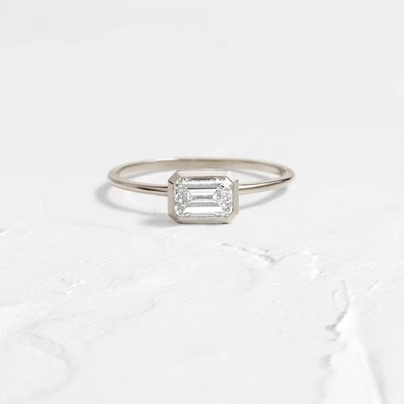East West Emerald Cut Moissanite Engagement Ring Bezel Set Emerald Cut Wedding Ring 14K Solid Gold Lab Grown Diamond Anniversary Ring.