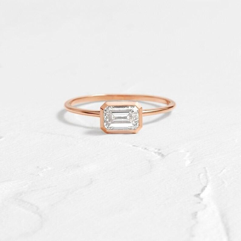 East West Emerald Cut Moissanite Engagement Ring Bezel Set Emerald Cut Wedding Ring 14K Solid Gold Lab Grown Diamond Anniversary Ring.
