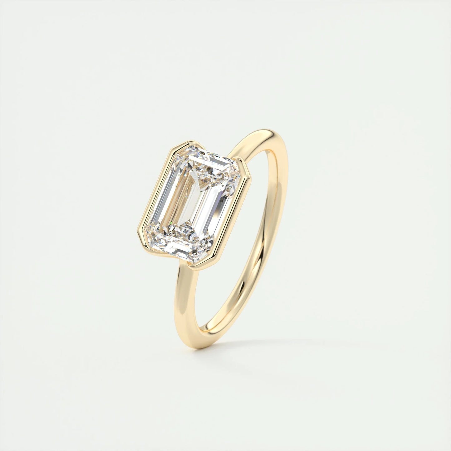 East To West Ring Half Bezel Set Emerald Cut Moissanite Engagement Ring 2 CT Solitaire Emerald Lab Grown Diamond Wedding Ring For Women.