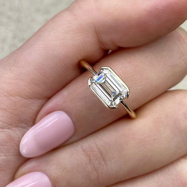 East To West Ring Half Bezel Set Emerald Cut Moissanite Engagement Ring 2 CT Solitaire Emerald Lab Grown Diamond Wedding Ring For Women.