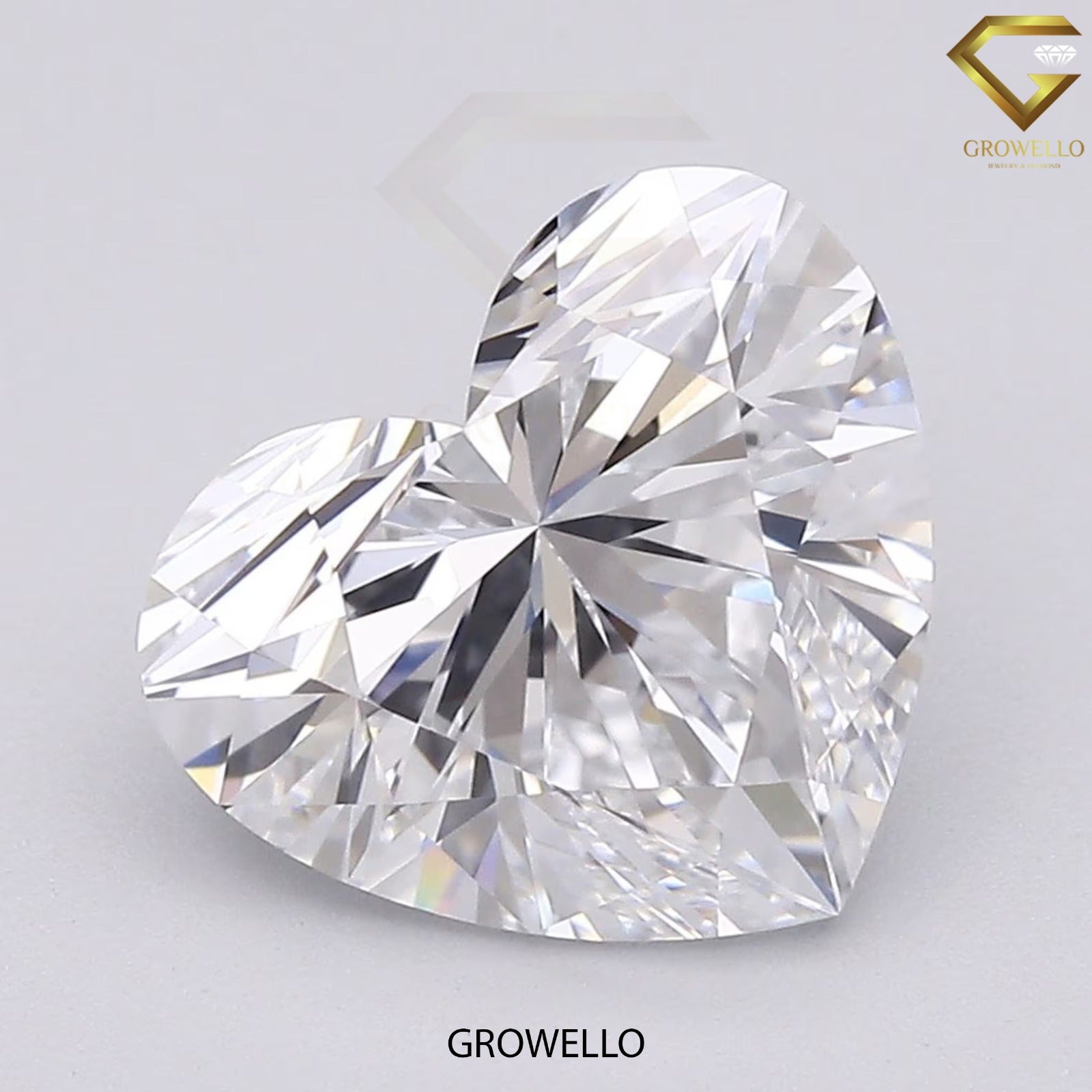 Heart-shaped diamond with 'Growello' branding on a light gray background